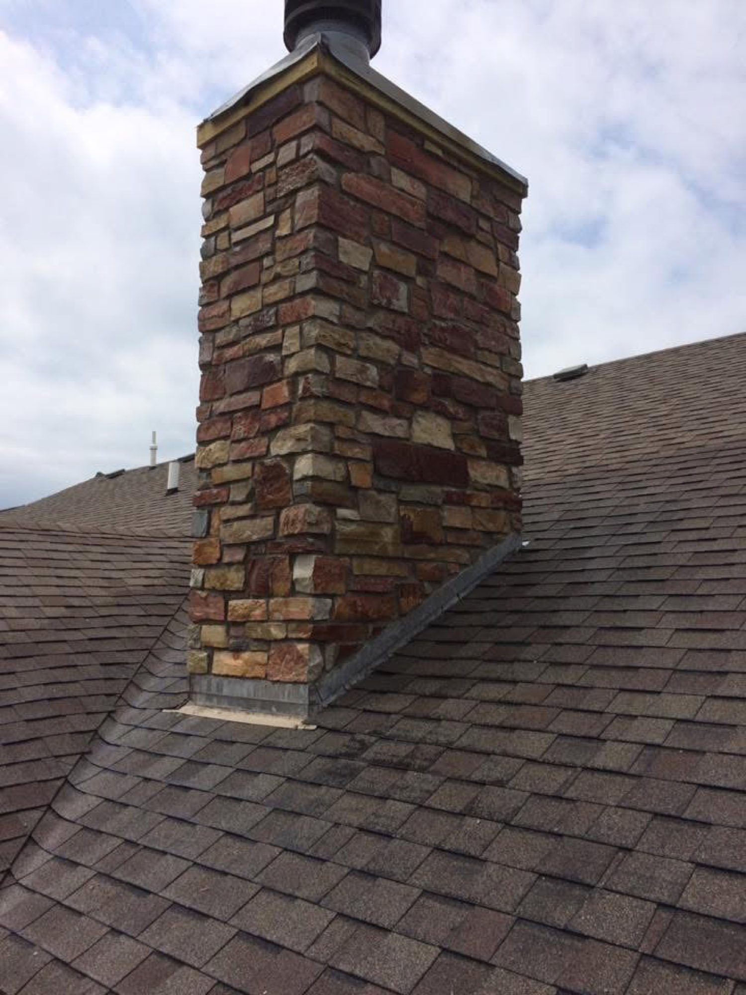 Stone chimney by Primestone Heritage in Arkansas